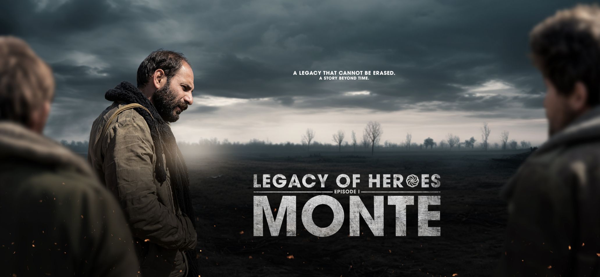 Key art: Monte Melkonian stands on a burned field under a storm sky. Legacy of Heroes, Episode I: Monte. A legacy that cannot be erased. A story beyond time.